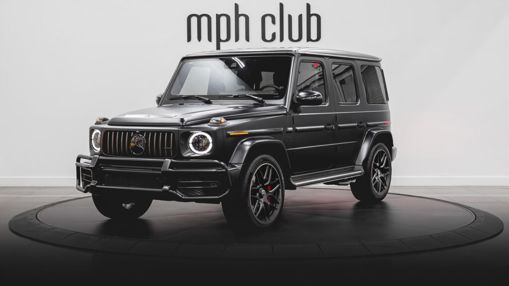 Matte black on black Mercedes Benz G63 AMG G Wagon rental profile view - mph club