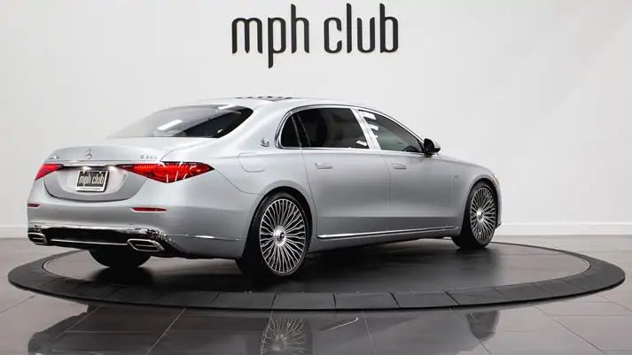 Silver Mercedes Benz Maybach S600 rental rear view - mph club