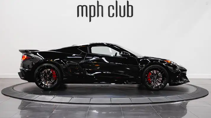 Black Chevrolet Corvette Z06 rental side view - mph club