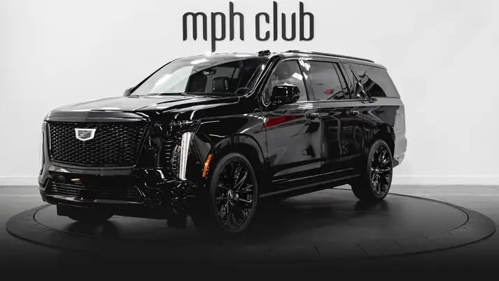 Black on black Cadillac Escalade ESV rental profile view rszd - mph club