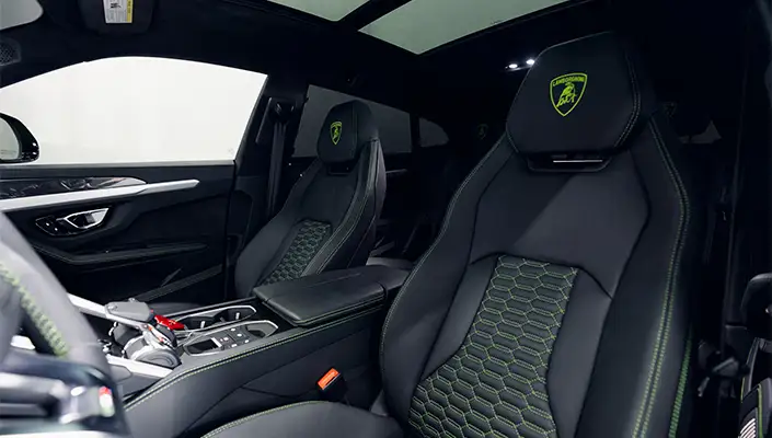 Green Lamborghini Urus rental interior view - mph club