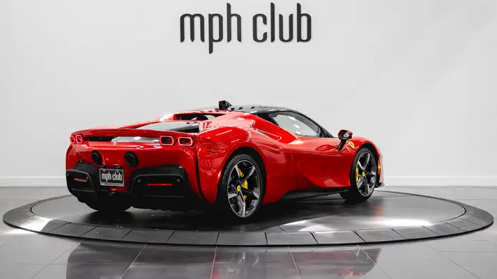 Red on red Ferrari SF90 rental rear view - mph club