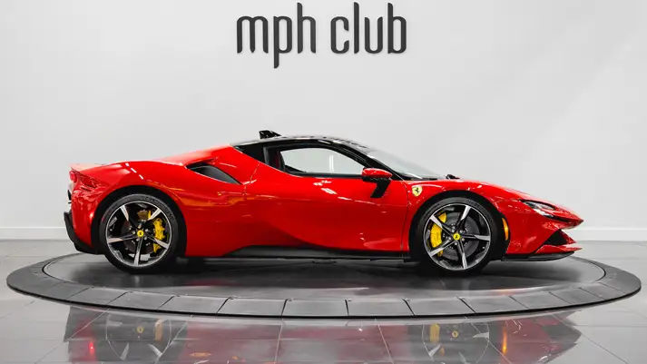 Red on red Ferrari SF90 rental side view - mph club