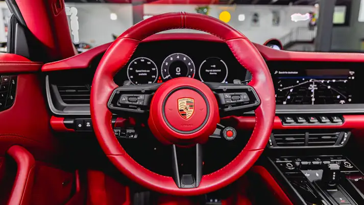 Silver Porsche 911 Carrera Cabriolet rental dashboard view - mph club