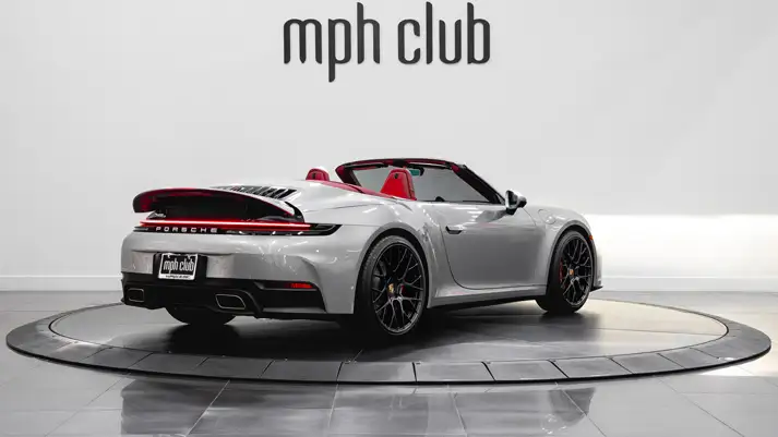 Silver Porsche 911 Carrera Cabriolet rental rear view - mph club
