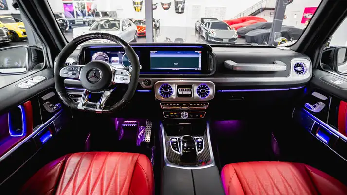 White Mercedes Benz AMG G63 4x4 SUV rental dashboard view - mph club