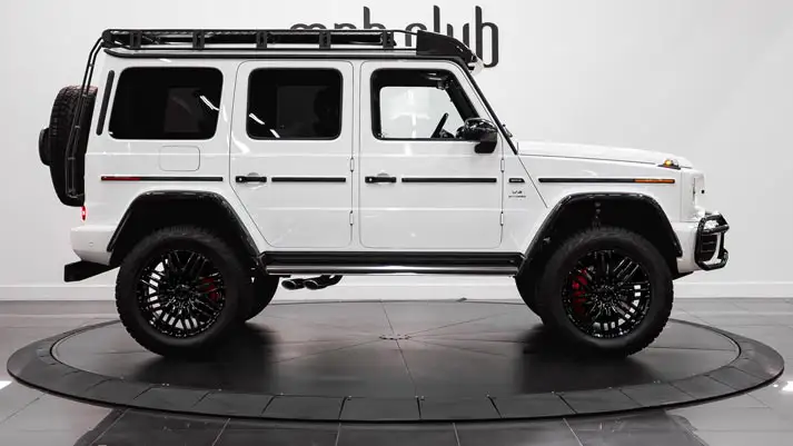 White Mercedes Benz AMG G63 4x4 SUV rental side view - mph club