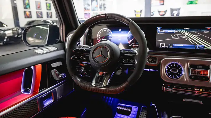 Black on red Mercedes Benz G63 rental dashboard view - mph club
