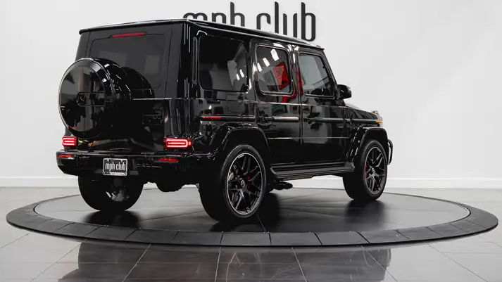 Black on red Mercedes Benz G63 rental rear view - mph club
