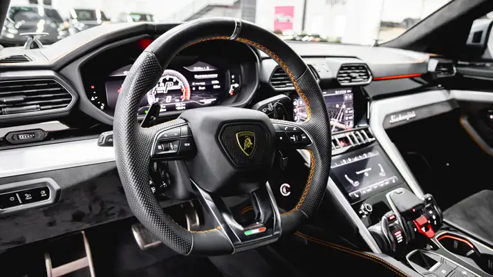Grey on grey Lamborghini Urus rental dashboard view - mph club