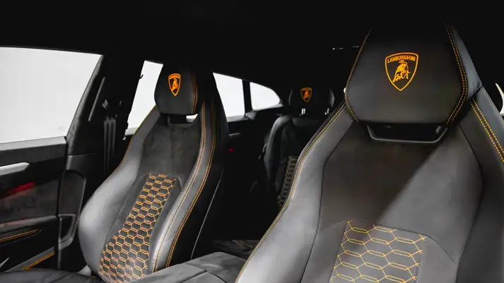 Grey on grey Lamborghini Urus rental interior view - mph club