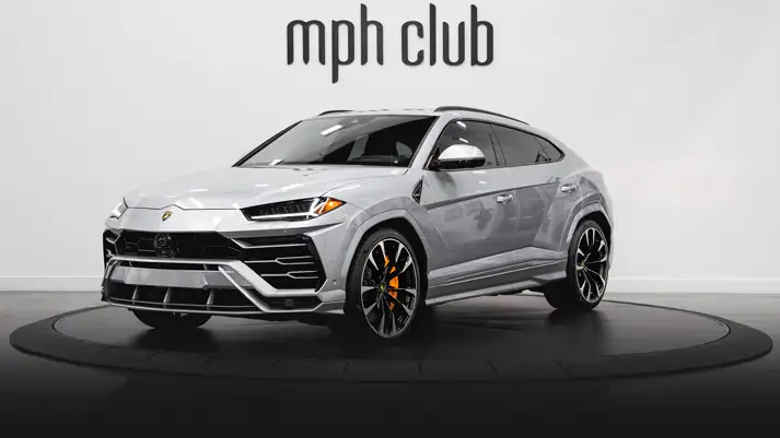Grey on grey Lamborghini Urus rental profile view rszd - mph club
