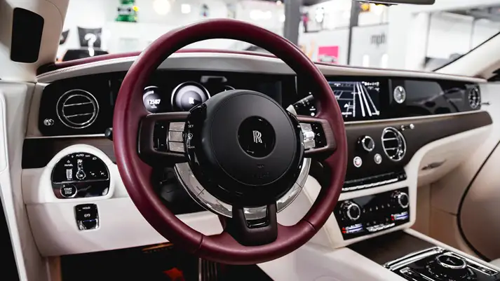 Pink Rolls Royce Spectre rental dashboard view - mph club