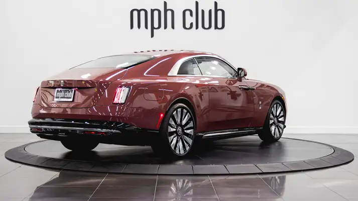 Pink Rolls Royce Spectre rental rear view - mph club