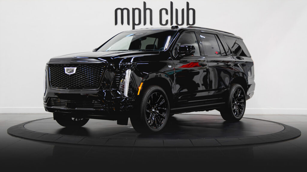 Black Cadillac Escalade Sport rental profile view - mph club