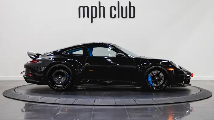 Black Porsche 911 GT3 rental side view - mph club