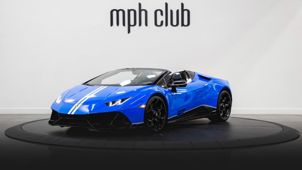 Blue on black Lamborghini Huracan EVO Spyder rental profile view - mph club