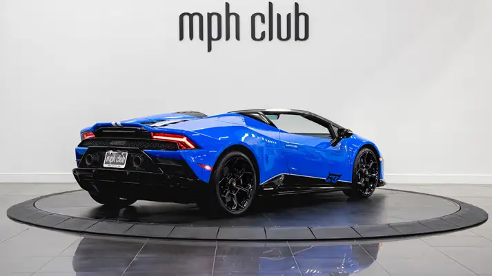 Blue on black Lamborghini Huracan EVO Spyder rental rear view - mph club