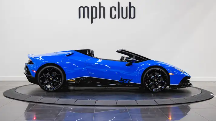 Blue on black Lamborghini Huracan EVO Spyder rental side view - mph club