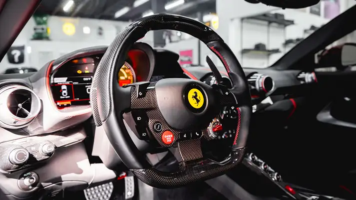 Red on black Ferrari 812 Superfast rental dashboard view - mph club