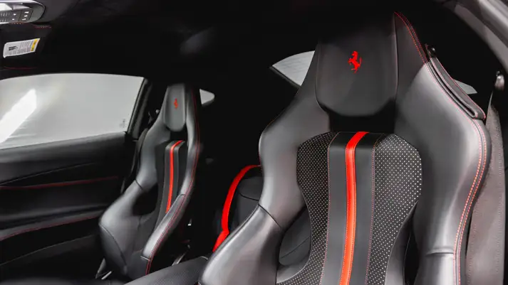 Red on black Ferrari 812 Superfast rental interior view - mph club