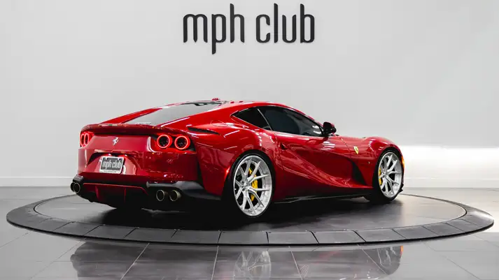 Red on black Ferrari 812 Superfast rental rear view - mph club