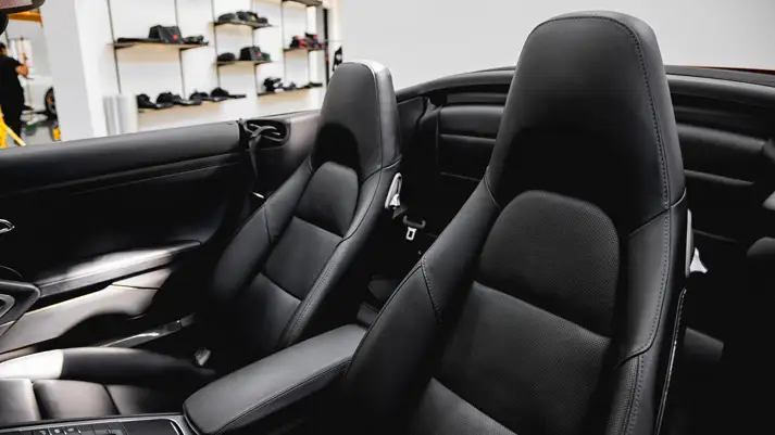 Red Porsche 911 Carrera Cabriolet rental interior view - mph club