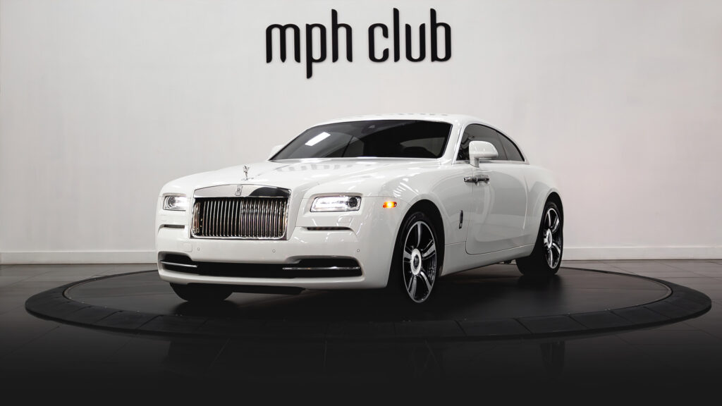 White on white Rolls Royce Wraith rental profile view - mph club 01