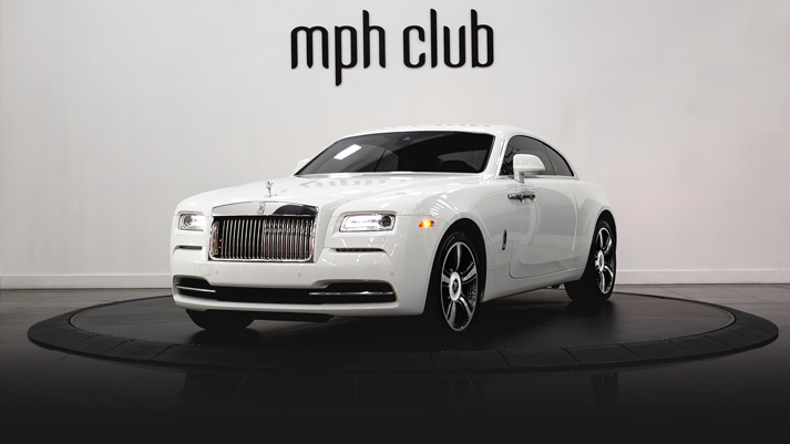 White on white Rolls Royce Wraith rental profile view rszd - mph club 01