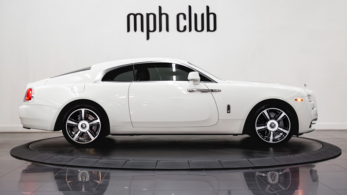 White on white Rolls Royce Wraith rental side view - mph club 01