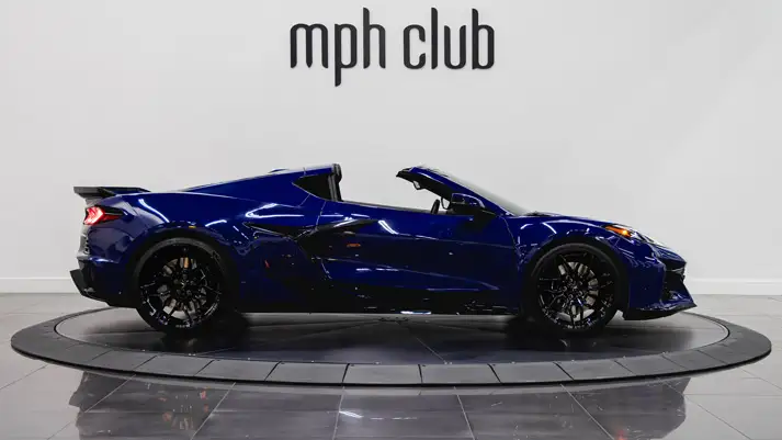 Blue Chevrolet Corvette Z06 rental side view - mph club