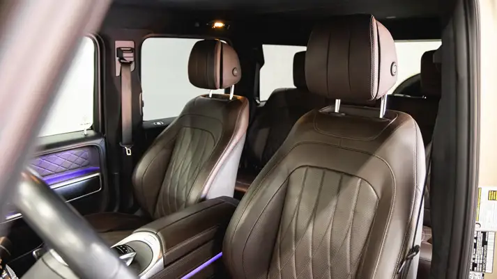 Gold Mercedes Benz G 550 rental interior view - mph club