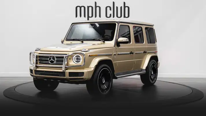 Gold Mercedes Benz G 550 rental profile view rszd - mph club
