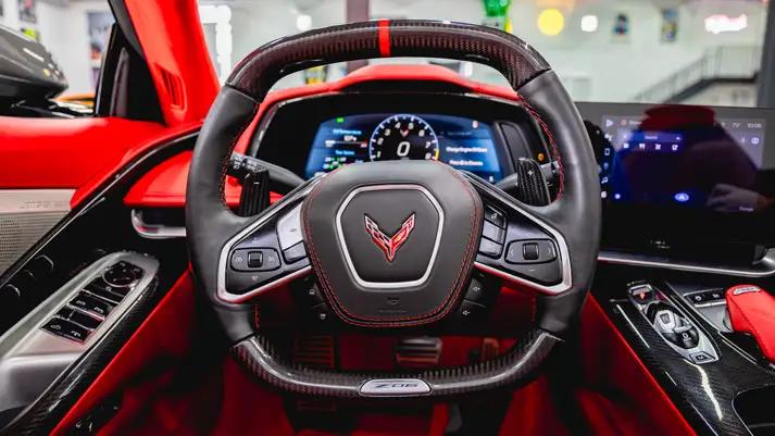 Grey Chevrolet Corvette Z06 rental dashboard view - mph club