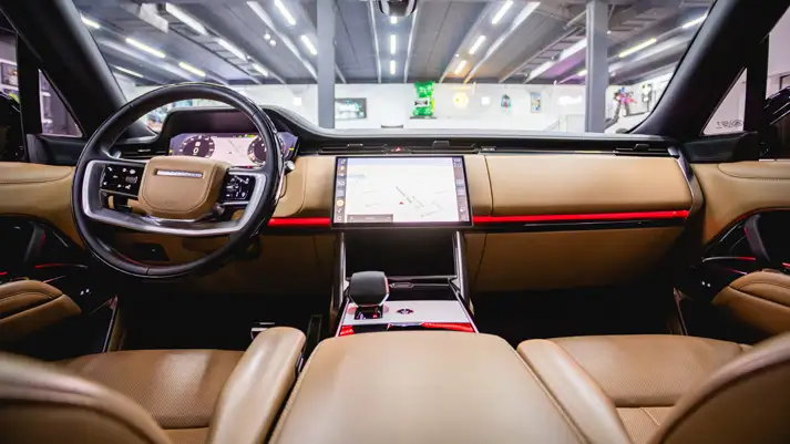 Black on brown Range Rover LWB rental dashboard view - mph club