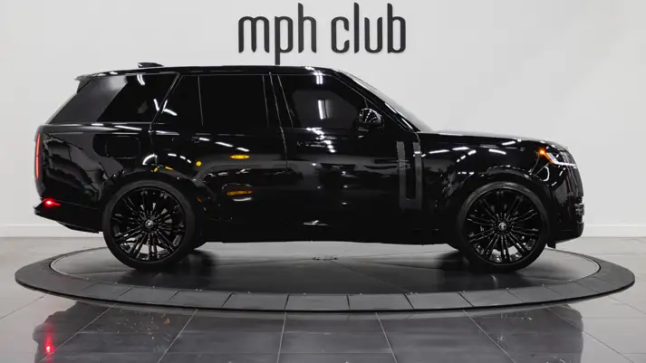Black on brown Range Rover LWB rental side view - mph club