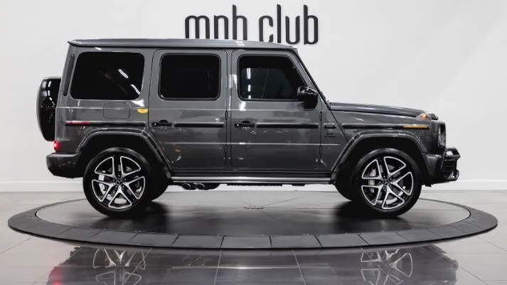 Grey Mercedes Benz AMG G63 SUV rental side view - mph club