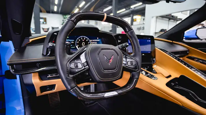 light-blue-chevrolet-corvette-z06-rental-dashboard-view-mph-club