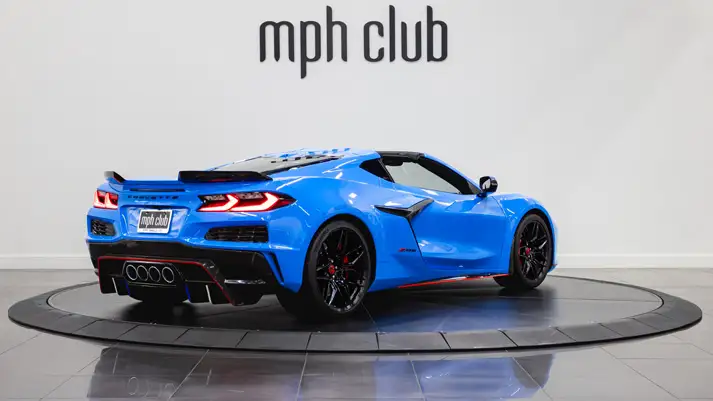light-blue-chevrolet-corvette-z06-rental-rear-view-mph-club