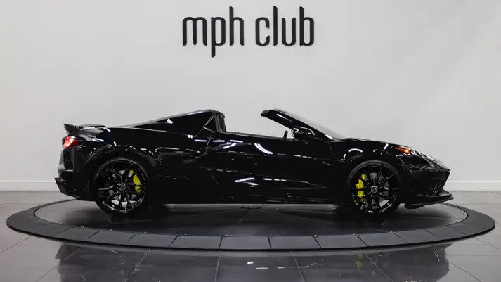 black-on-black-chevrolet-corvette-c8-for-rent-miami-side-view-mph-club