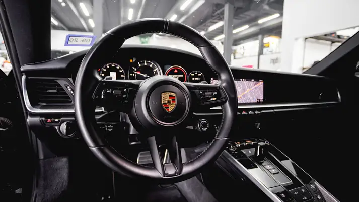black-porsche-911-carrera-s-rental-dashboard-view-mph-club