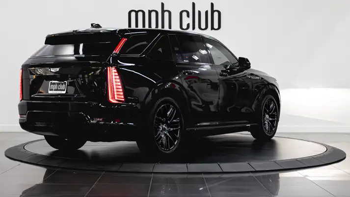 Cadillac Escalade IQ rental rear view - mph club