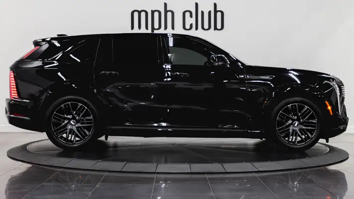 Cadillac Escalade IQ rental side view - mph club