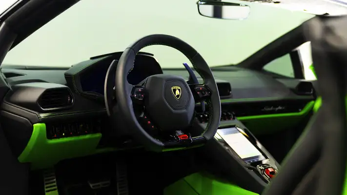 Green on green Lamborghini Huracan EVO Spyder rental dashboard view - mph club