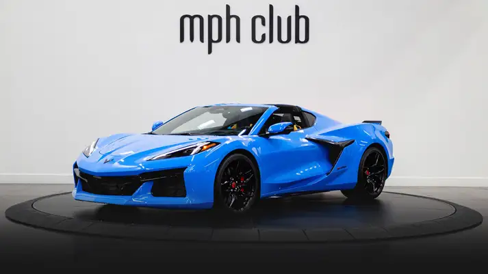 Light blue Chevrolet Corvette Z06 rental profile view rszd - mph club