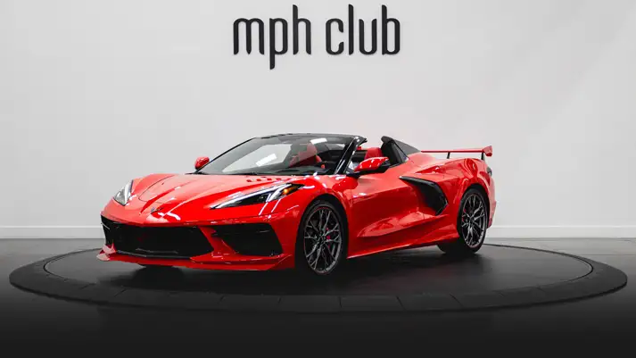 Red on red Chevrolet Corvette C8 for rent profile view rszd - mph club