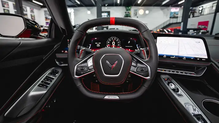 red-on-red-chevrolet-corvette-z06-rental-dashboard-view-mph-club