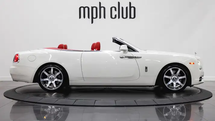 White on red Rolls Royce Dawn for rent side view - mph club