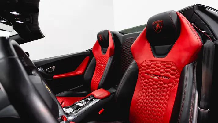 Black on red Lamborghini Huracan Spyder rental interior view - mph club