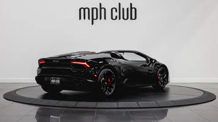 Black on red Lamborghini Huracan Spyder rental rear view - mph club